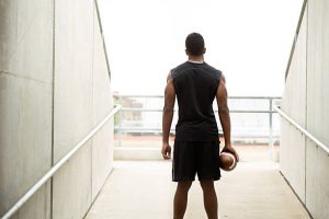 Silhouette of a male athlete