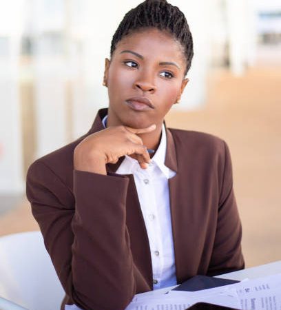 Young woman thinking about multiple job offers