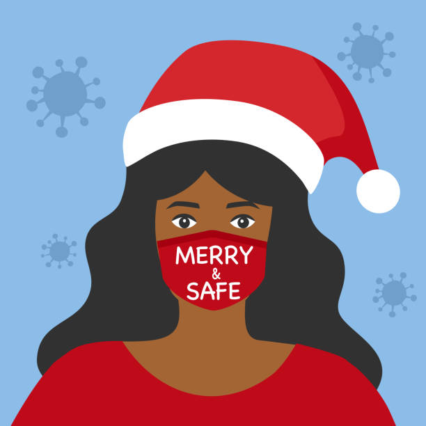 Black woman wearing medical face mask and Santa Claus hat