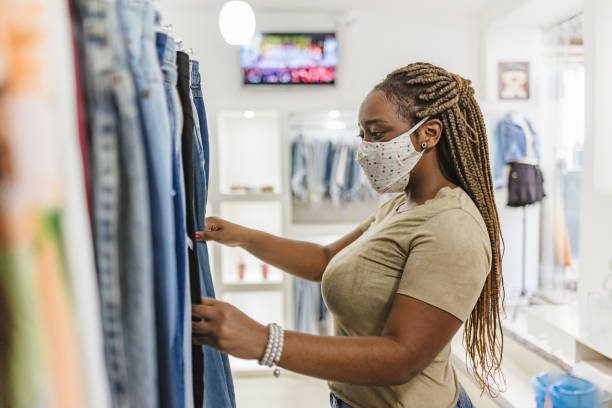 A young lady at the mall, shopping for clothes