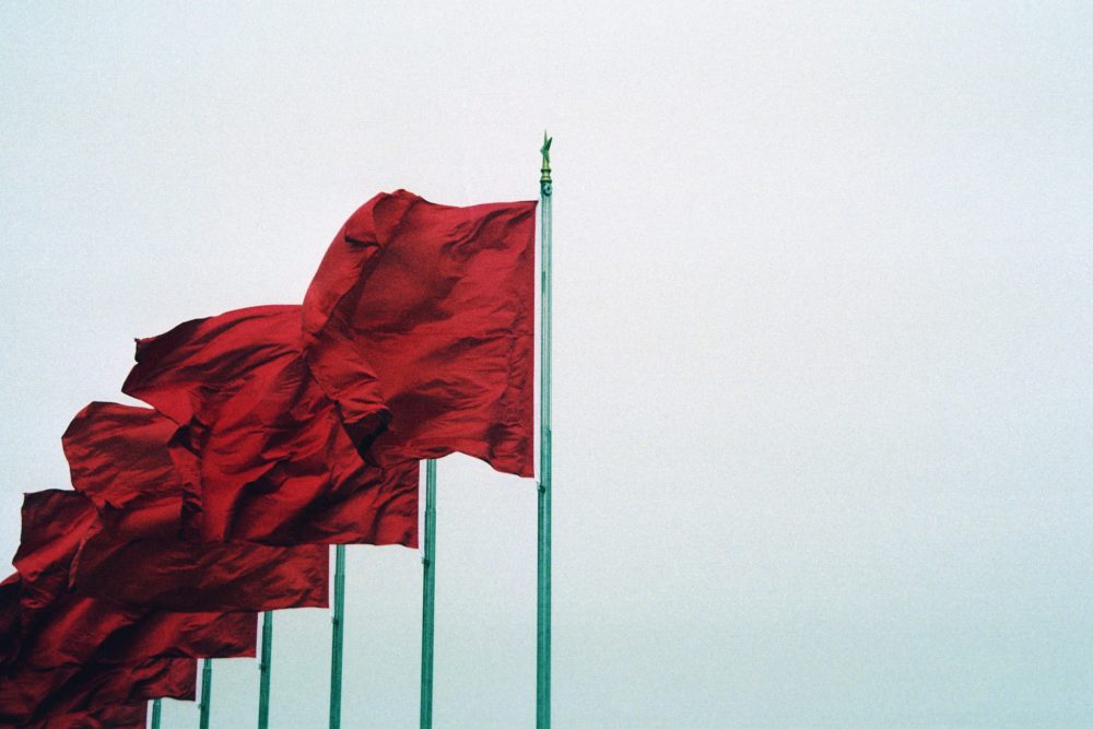 A shot red flags on poles