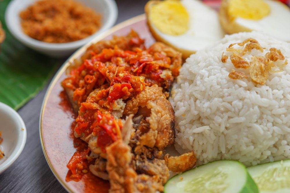 A plate of food with other plates in the background