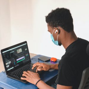 Young man working on a computer at work